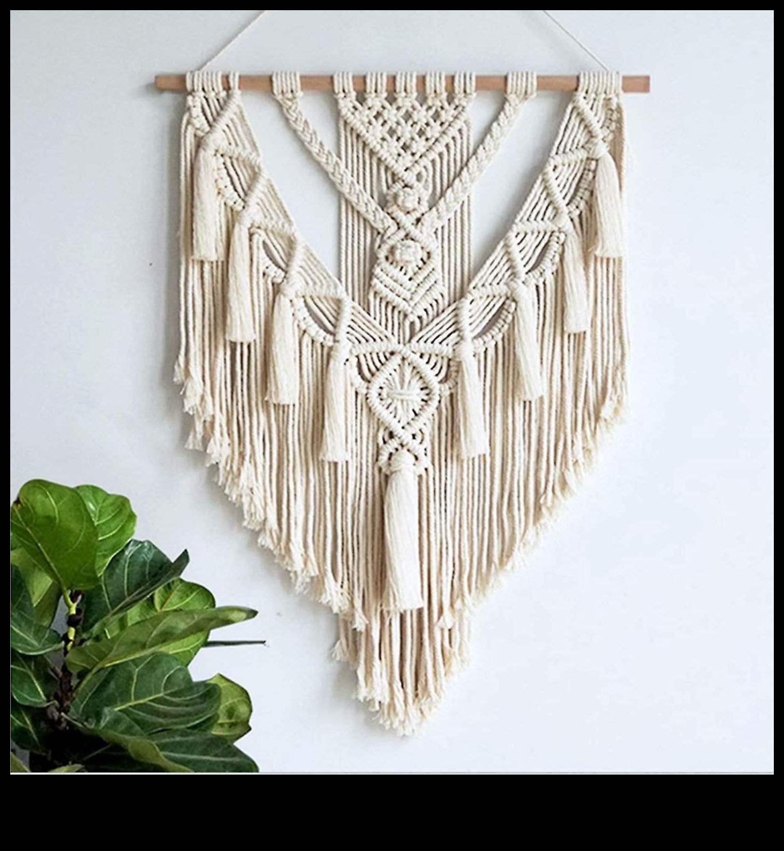 האם אתה יכול להמליץ ​​על דרכים להשתמש ב-Macrame בעיצוב בוהו מודרני לתוספת מרקם?