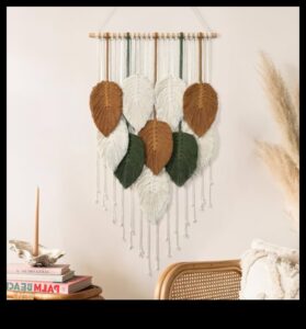 האם אתה יכול להמליץ ​​על דרכים להשתמש ב-Macrame בעיצוב בוהו מודרני לתוספת מרקם?